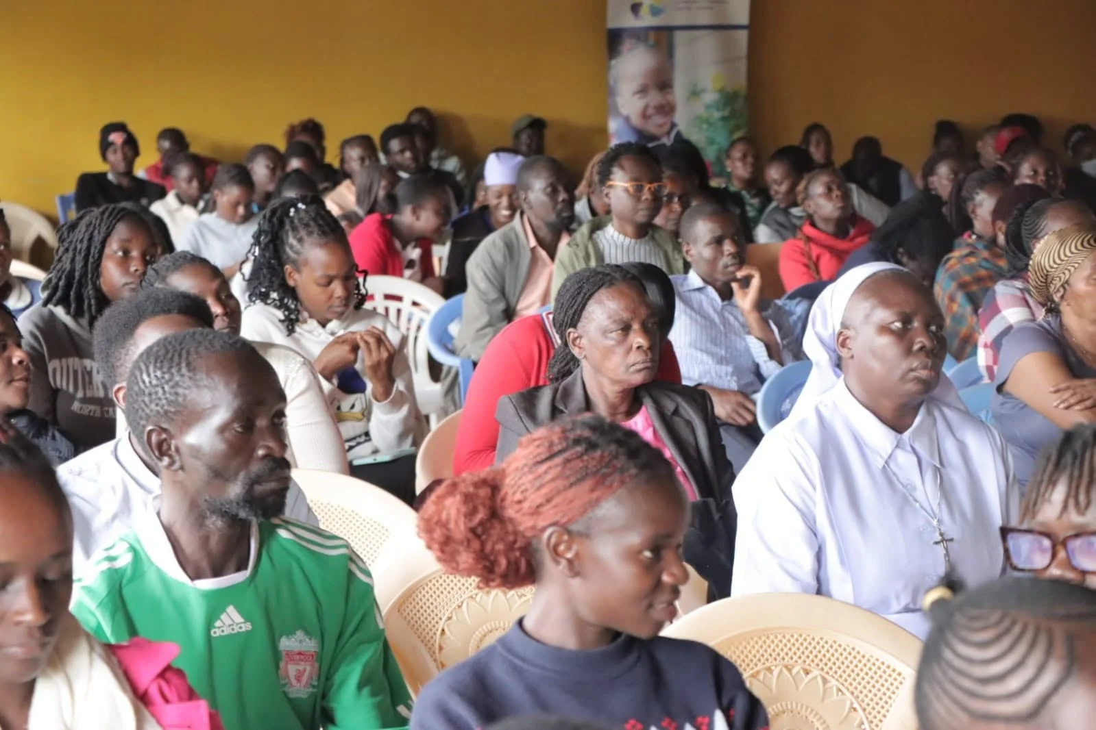 Stakeholders working with children  during a training at the OCTC in Kandisi ,Ongata Rongai, Kajiado County